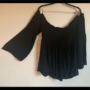 Black scrunch top with bell sleeves.